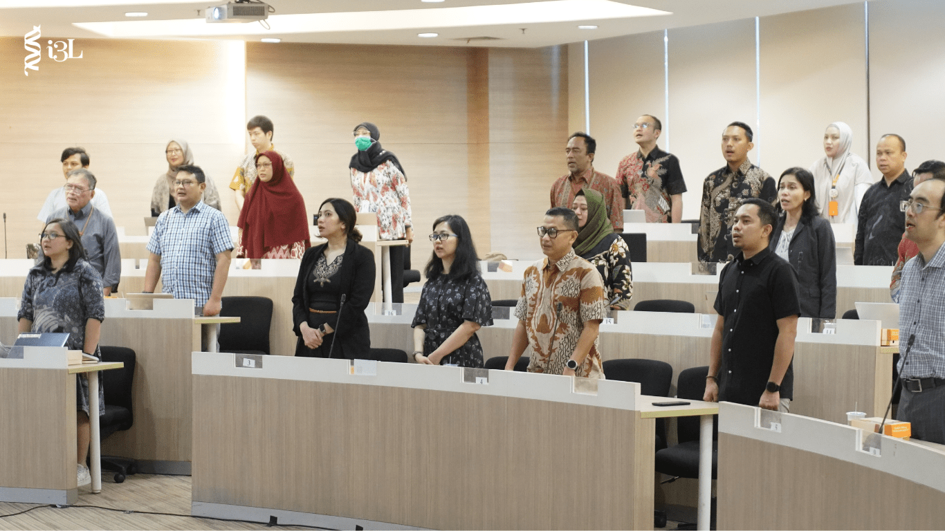 everyone stands up to sing Indonesia's national anthem